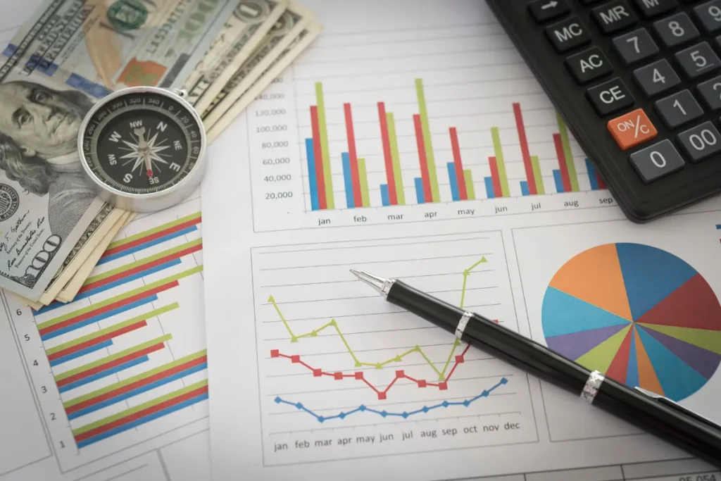Financial planning for buying a home in the United States, showing budget charts and money used for mortgage preparation